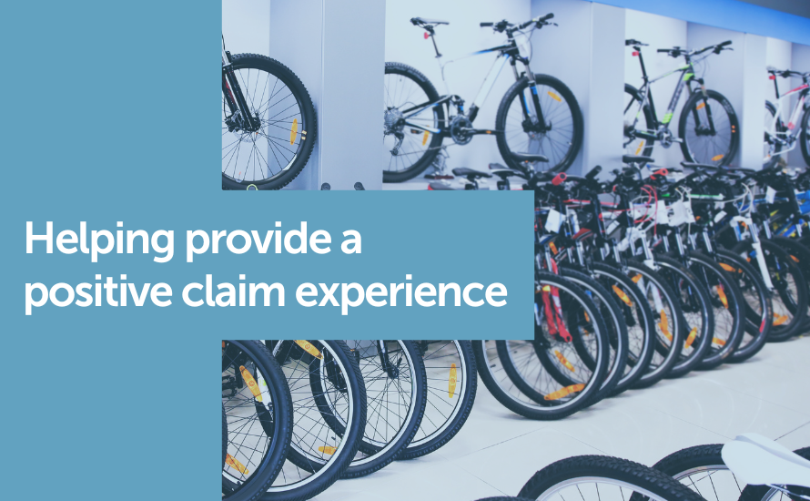 Bikes in a shop with the writing Helping provide a positive claim experience. Claimable claims management software.